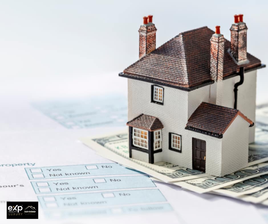 Model house on financial documents